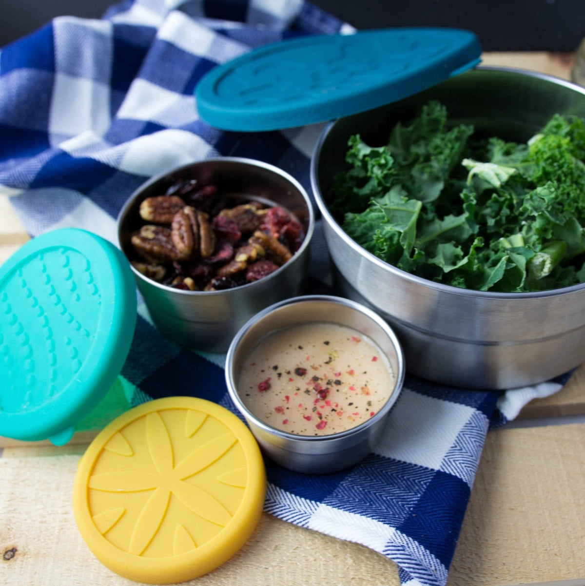 http://ecolunchboxes.com/cdn/shop/products/blue-water-bento-lunch-kits-seal-cup-sixsome-set-41296764404013_1200x.jpg?v=1684207889
